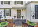 Inviting front porch with decorative wreath and planters enhancing the home's entrance at 2243 Flint Glenn Ln, Charlotte, NC 28262