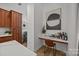 Features a bar with a quartz countertop and ample storage at 230 S Tryon St # 610, Charlotte, NC 28202