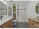 Stylish bathroom with a glass-enclosed shower and modern vanity at 230 S Tryon St # 610, Charlotte, NC 28202