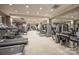 Fully equipped gym featuring weight machines, treadmills and mirrored walls at 230 S Tryon St # 610, Charlotte, NC 28202