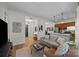 Contemporary living room with an open layout, modern decor, and hardwood flooring throughout at 230 S Tryon St # 610, Charlotte, NC 28202