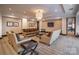Comfortable lounge area with couches, chairs, soft lighting, and a television at 230 S Tryon St # 610, Charlotte, NC 28202