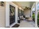 Cozy front porch with comfortable seating, perfect for relaxing outdoors at 270 Almora Loop, Mooresville, NC 28115