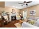 Cozy living room with a fireplace, hardwood floors, and natural light at 270 Almora Loop, Mooresville, NC 28115