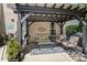 Comfortable shaded patio with a stylish seating area and elegant decor at 270 Almora Loop, Mooresville, NC 28115
