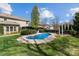 Beautiful backyard featuring a private in-ground pool surrounded by lush green grass at 270 Almora Loop, Mooresville, NC 28115