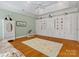 Charming bedroom with built-in storage and a ceiling fan, perfect for children or guests at 3600 Castellaine Dr, Charlotte, NC 28226