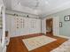 Bright bedroom with built-in storage and a ceiling fan, providing a cozy and organized space at 3600 Castellaine Dr, Charlotte, NC 28226