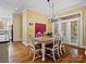 Bright dining area with natural light and seating for six at 3600 Castellaine Dr, Charlotte, NC 28226