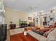 Spacious living room with built-in shelving and comfortable furniture at 3600 Castellaine Dr, Charlotte, NC 28226