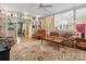 Open-concept living room with seamless access to a casual dining area at 3600 Castellaine Dr, Charlotte, NC 28226