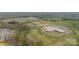Aerial view of the community schools in a wooded area near a housing development at 3918 Dahlia Dr # 15, Harrisburg, NC 28075