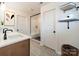Contemporary bathroom featuring a double sink vanity, glass-enclosed shower, and stylish tile flooring at 3918 Dahlia Dr # 15, Harrisburg, NC 28075