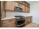 Well-equipped kitchen with stainless steel appliances and a white subway tile backsplash at 3918 Dahlia Dr # 15, Harrisburg, NC 28075