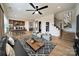 Spacious open-concept living room with modern furnishings, stylish decor, and a clear view to the dining room at 3918 Dahlia Dr # 15, Harrisburg, NC 28075