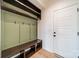 Mud room with bench seating, hooks, and storage shelves at 3918 Dahlia Dr # 15, Harrisburg, NC 28075
