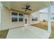 Covered patio with ceiling fan, concrete floor, and view of the backyard at 3918 Dahlia Dr # 15, Harrisburg, NC 28075
