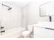 Modern bathroom with sleek vanity, walk-in shower with subway tile surround and modern fixtures at 411 Cemetery St, Charlotte, NC 28216