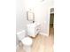 Contemporary bathroom with floating vanity, modern sink and black hardware, and tile flooring at 411 Cemetery St, Charlotte, NC 28216
