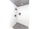 Modern shower with gray tile and black fixtures offering a spa-like experience with ample space and sleek design at 411 Cemetery St, Charlotte, NC 28216