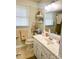 Neutral bathroom featuring a large mirror and white vanity at 453 Cotton Ct, York, SC 29745