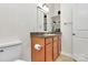 Bathroom features a vanity, tiled floor and a toilet at 474 New Bern Station Ct, Charlotte, NC 28209