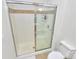 Bathroom features a glass shower door, vanity, and neutral tile floors at 474 New Bern Station Ct, Charlotte, NC 28209