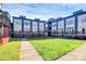 Multi-Gathering exterior features well-maintained lawn, outdoor patios at 474 New Bern Station Ct, Charlotte, NC 28209