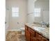 Bathroom featuring granite counters, vanity and tile flooring at 5032 Eagles Crest Ln, Gastonia, NC 28056