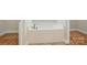 A relaxing soaking tub with tile flooring at 5032 Eagles Crest Ln, Gastonia, NC 28056