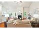 Bright living room with hardwood floors, a fireplace, and neutral decor for a relaxing atmosphere at 5032 Eagles Crest Ln, Gastonia, NC 28056