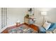 Bright office space features a desk, a chair, a lamp and hardwood flooring at 5032 Eagles Crest Ln, Gastonia, NC 28056