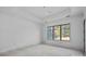 Bright bedroom featuring a large window offering natural light in this home at 5039 Eliza Long Wilkie Dr, Huntersville, NC 28078