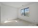 Bedroom with window and neutral walls at 5039 Eliza Long Wilkie Dr, Huntersville, NC 28078