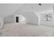 Large bonus room with neutral walls and one window at 5039 Eliza Long Wilkie Dr, Huntersville, NC 28078