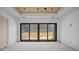 Bright and airy room with large sliding doors leading to the outdoors at 5039 Eliza Long Wilkie Dr, Huntersville, NC 28078