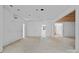 Unfinished room with multiple doorways and natural light, ready for customization at 5039 Eliza Long Wilkie Dr, Huntersville, NC 28078