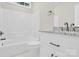 Clean bathroom featuring a tub-shower combo, white fixtures, granite countertops, and ample storage space at 6520 White Pine Ln, Charlotte, NC 28262
