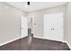 Hardwood bedroom featuring neutral walls, access to other rooms, closet, and natural light at 6520 White Pine Ln, Charlotte, NC 28262
