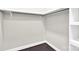 Picture of an empty walk-in closet featuring built-in shelving and hardwood floors at 6520 White Pine Ln, Charlotte, NC 28262