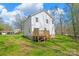 Exterior of home featuring a wooden deck in a well-maintained backyard at 701 Applewood St, Kannapolis, NC 28081