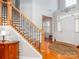 Inviting foyer with hardwood floors, staircase and natural light at 706 Springwood Dr # 14, Waxhaw, NC 28173