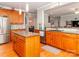 Spacious kitchen with wooden cabinets, island and stainless steel appliances at 706 Springwood Dr # 14, Waxhaw, NC 28173