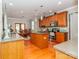 Bright kitchen with stainless steel appliances, wood cabinets, island and granite countertops at 706 Springwood Dr # 14, Waxhaw, NC 28173