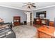 Living room featuring a gray wall color, hardwood floor with area rug, and home theatre at 706 Springwood Dr # 14, Waxhaw, NC 28173
