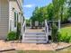 Beautiful deck with outdoor seating, manicured landscaping, and inviting atmosphere at 706 Springwood Dr # 14, Waxhaw, NC 28173
