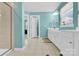 Spacious primary bathroom featuring double vanity sinks, a shower, and natural light from the window at 7278 Waterwheel St, Concord, NC 28025