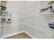 Organized walk-in pantry with spacious shelving perfect for storing groceries and household goods at 7278 Waterwheel St, Concord, NC 28025
