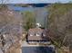 Aerial view of home showcasing mature trees, and a welcoming front porch at 8172 Summit Ridge Dr, Catawba, NC 28609