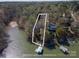 Aerial view showcasing property lines, covered boat dock, and access to the water at 8172 Summit Ridge Dr, Catawba, NC 28609